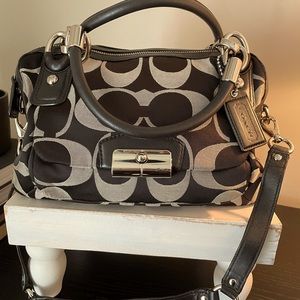 Coach purse!! Can be used as a shoulder or arm.